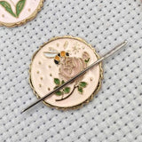 Needle Minders